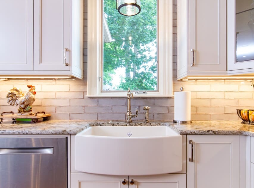 kitchen sink with a light and window