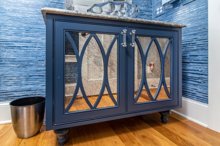 blue bathroom vanity with mirror glass
