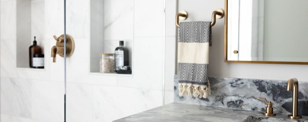 bathroom vanity and glass walk in shower