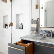 bathroom vanity and glass walk in shower