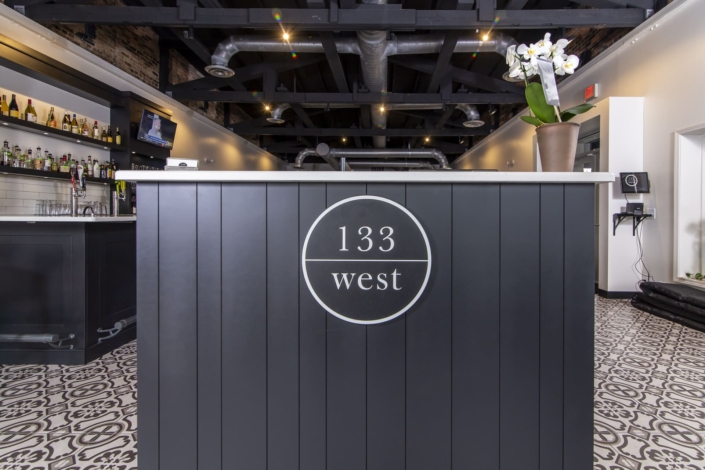 hostess stand with a plant