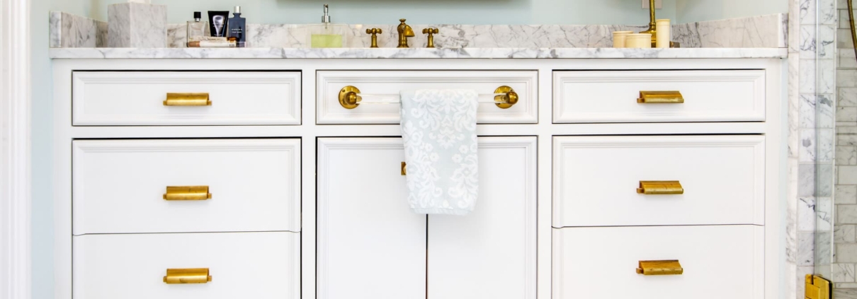 bathroom vanity with a towel drying bar