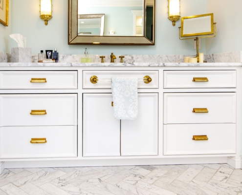 bathroom vanity with a towel drying bar