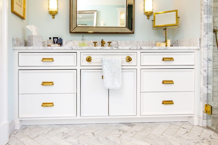 bathroom vanity with a towel drying bar