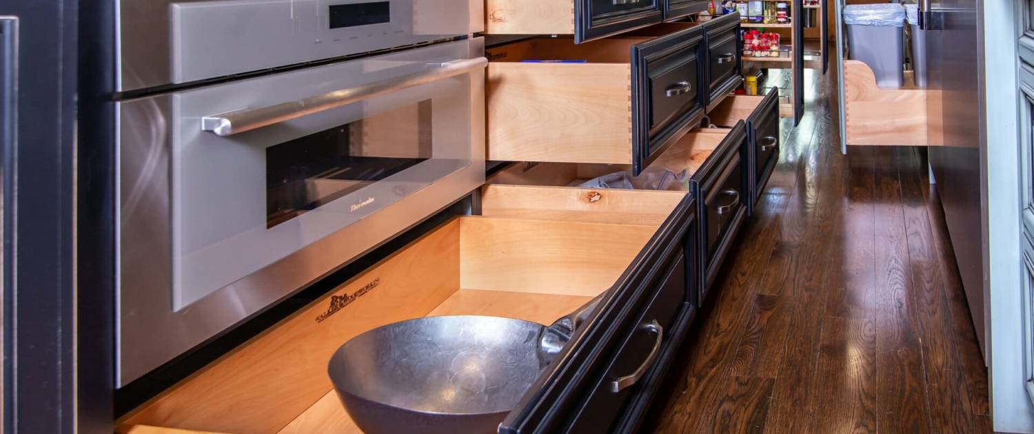 black kitchen island with drawers
