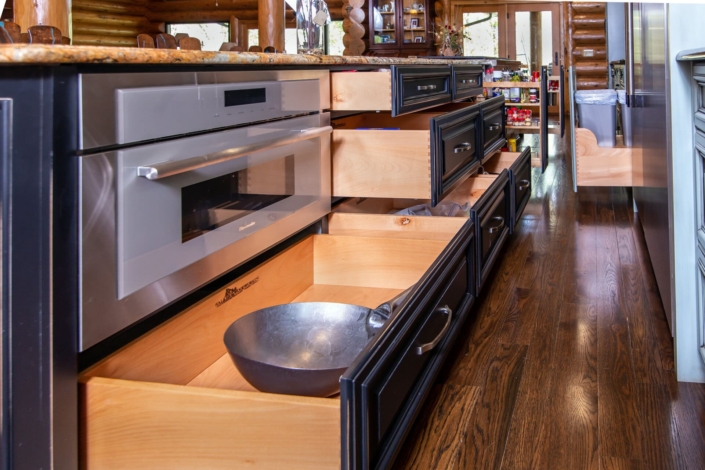 black kitchen island with drawers