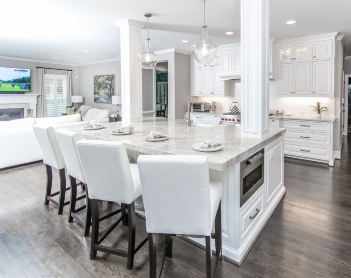 white kitchen with barstools
