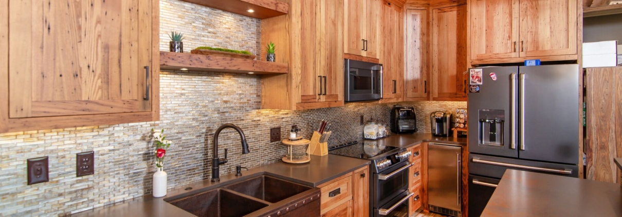 chesnut kitchen cabinets in pool house