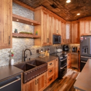 chesnut kitchen cabinets in pool house