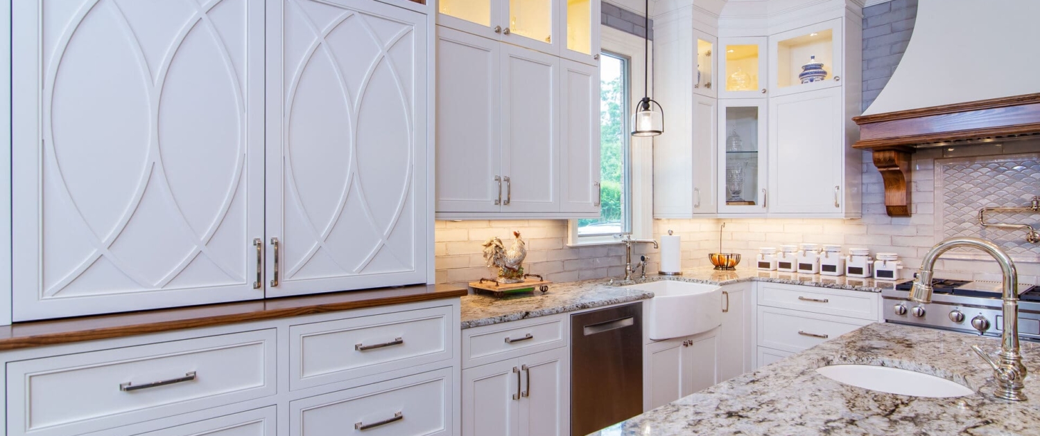 white kitchen with mullion cabinet doors