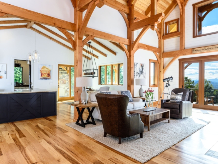 large mountain farmhouse with glass windows