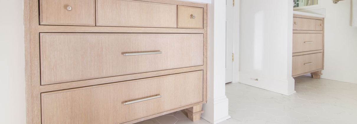 bathroom vanity with tile flooring
