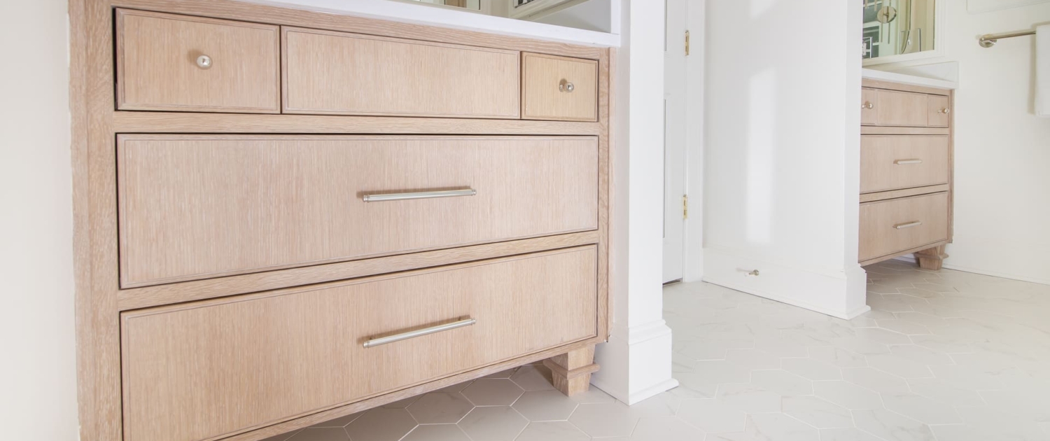bathroom vanity with tile flooring
