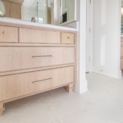 bathroom vanity with tile flooring