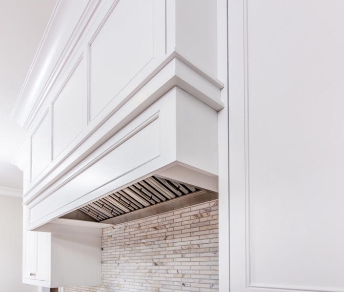 white kitchen hood and tile