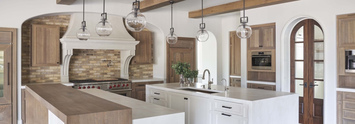 white and brown kitchen with doors
