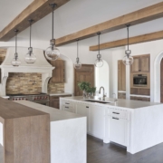 white and brown kitchen with doors