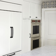 white kitchen with panel appliances