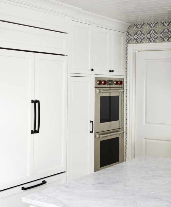 white kitchen with panel appliances