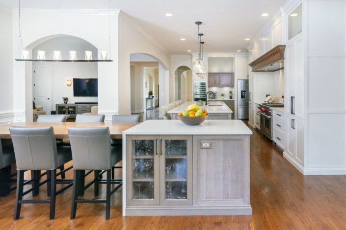 big white kitchen with a dining area