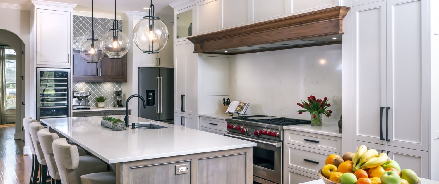 white kitchen with brown hood