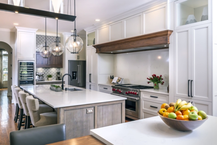 white kitchen with brown hood