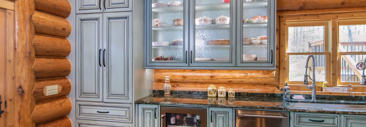 green cabinets with glass doors