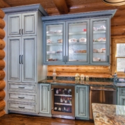 green cabinets with glass doors