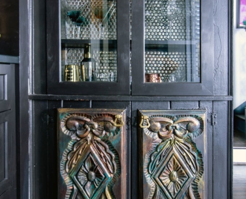 wet bar with glass doors