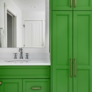 green bathroom with two sinks