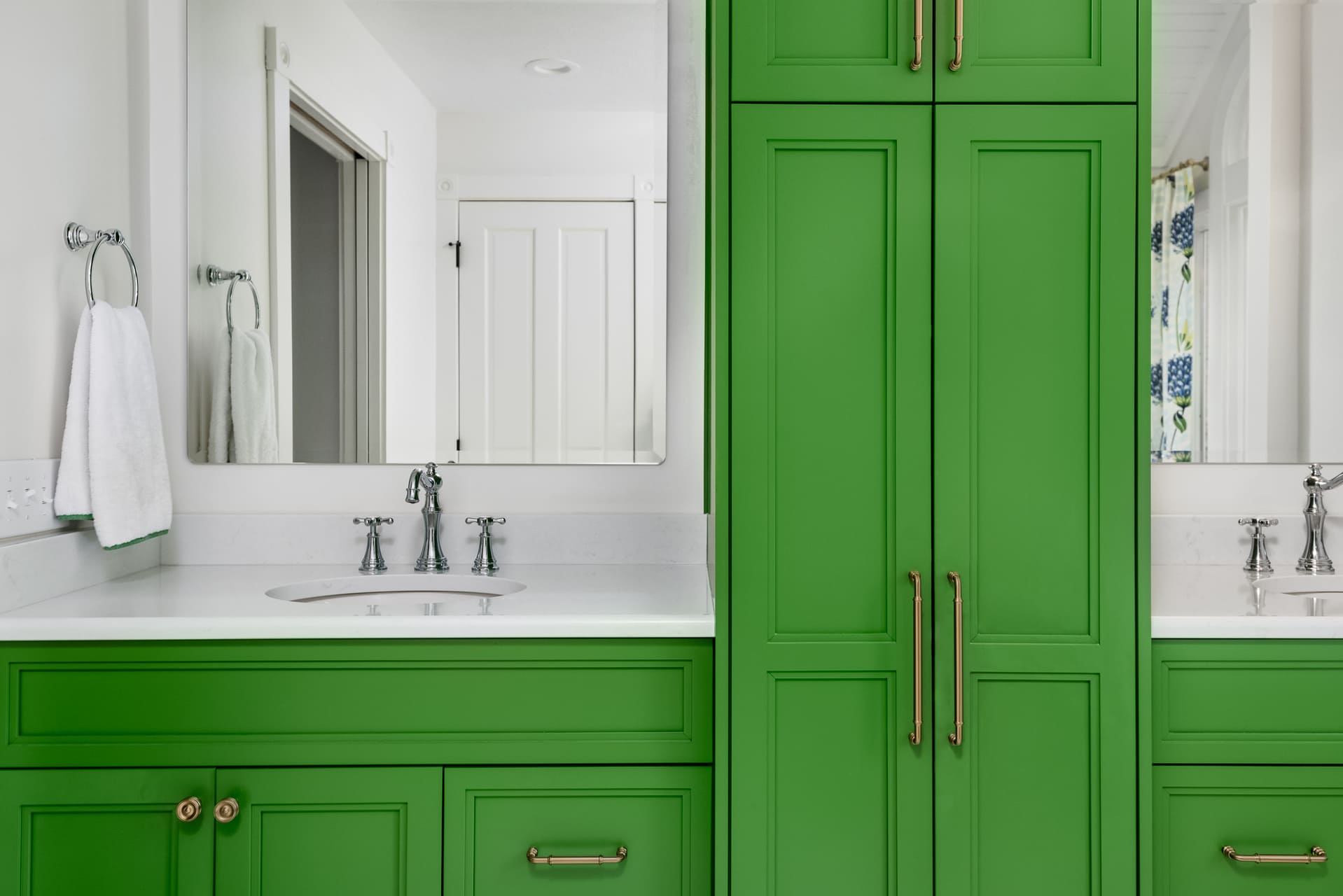 green bathroom with two sinks