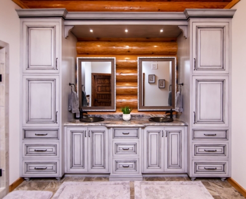 gray bathroom in a log cabin