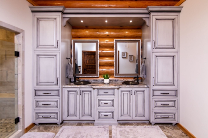 gray bathroom in a log cabin