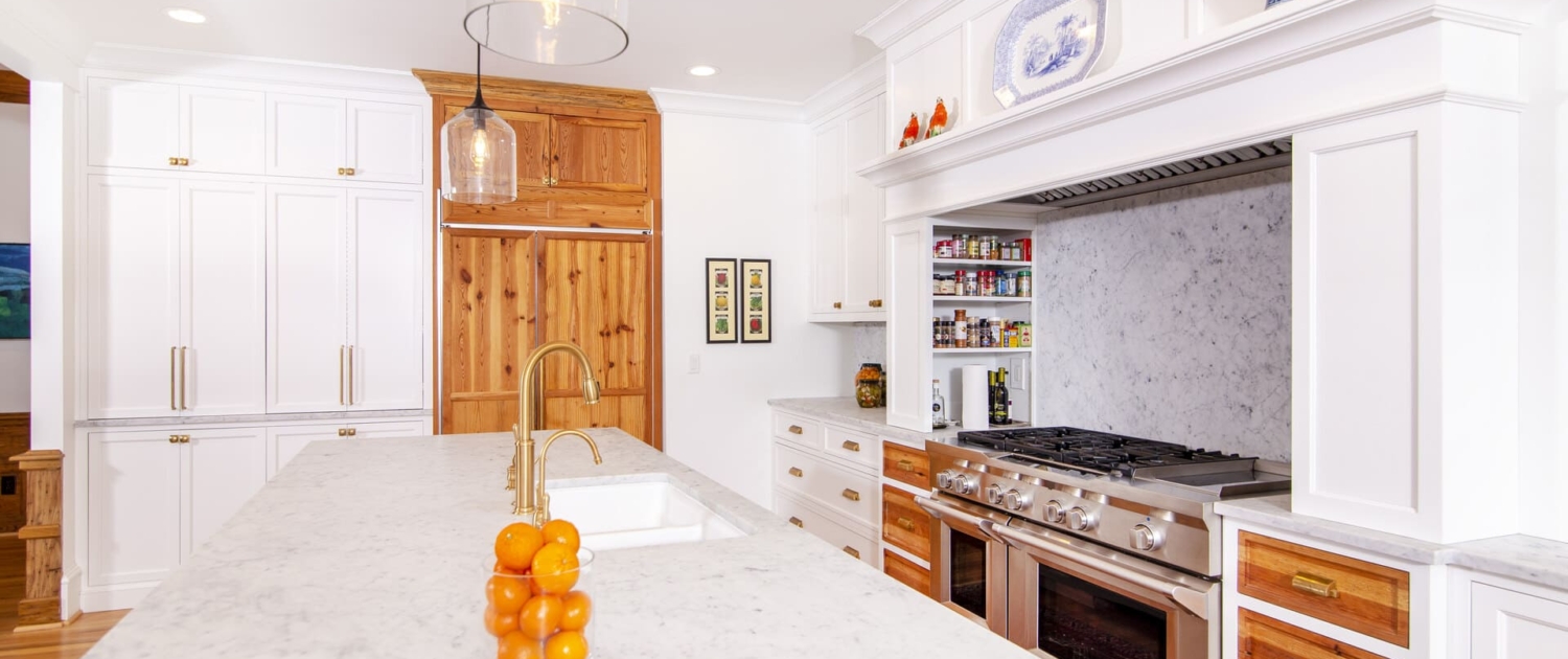 white kitchen and sink in island