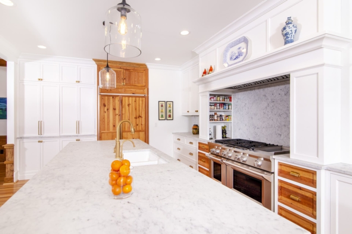 white kitchen and sink in island