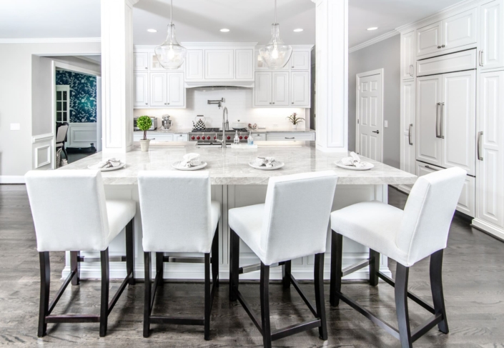 white kitchen and barstools