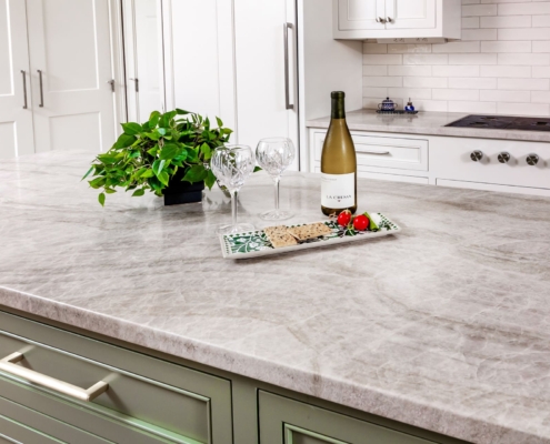 marble countertops with snacks and wine