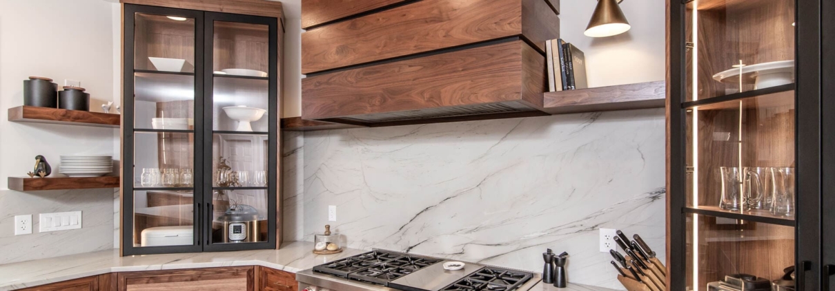 Large walnut hood with white backsplash