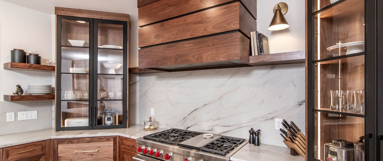 Large walnut hood with white backsplash