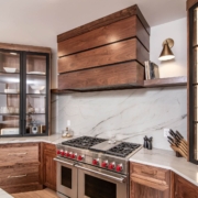 Large walnut hood with white backsplash
