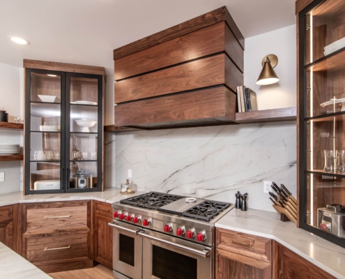 Large walnut hood with white backsplash