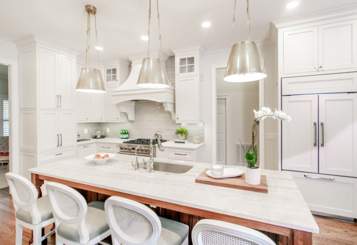 white kitchen with big lights