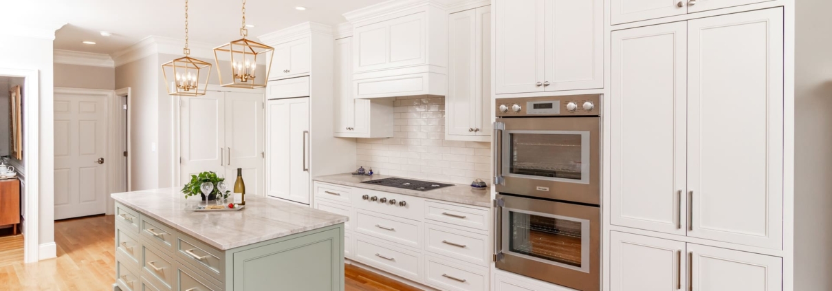 white kitchen and paneled appliances