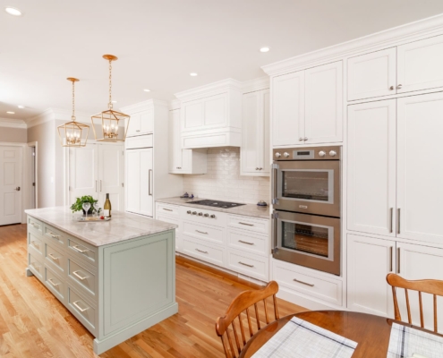 white kitchen and paneled appliances