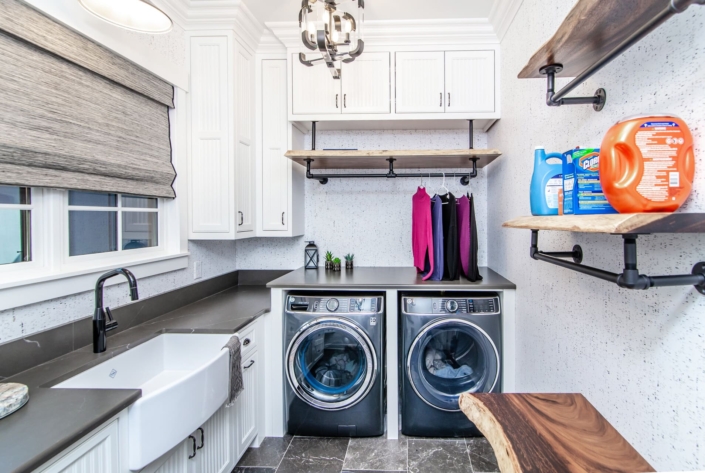 laundry room with windows