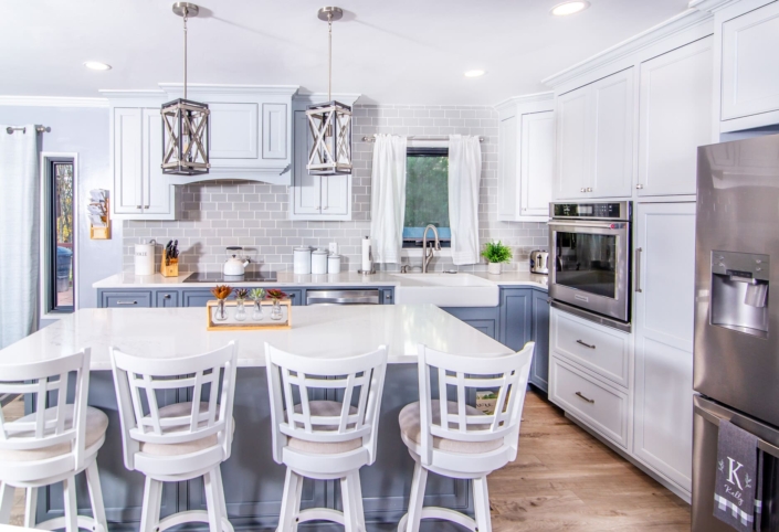blue kitchen with windows