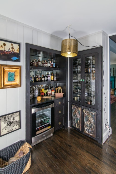 wet bar beverage center with storage shelves