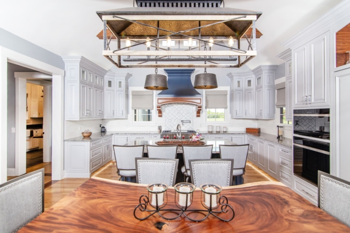 dining table and white kitchen