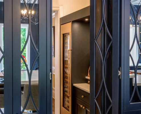 Secret cabinet door entryway into a pantry