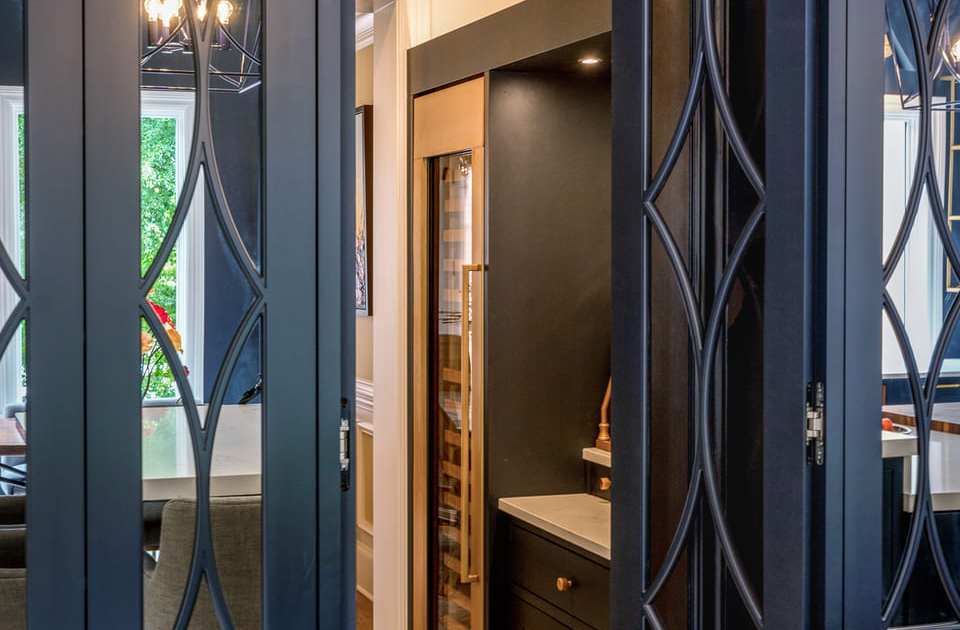 Secret cabinet door entryway into a pantry
